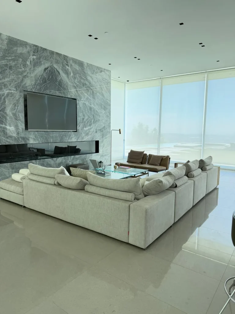 Luxury living room with floor-to-ceiling windows cleaned in Los Angeles